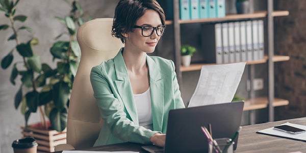 Woman working in her home office